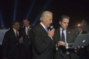 Vice President Joe Biden with son Robert Hunter Biden holding MacBook Air, President Barack Obama celebrated in background Election Night, Democratic Presidential Nominee, Barack Obama with Joe Biden and Son on election night in Chicago, IL on Wednesday, November 5, 2008. (David Katz/Obama for America)