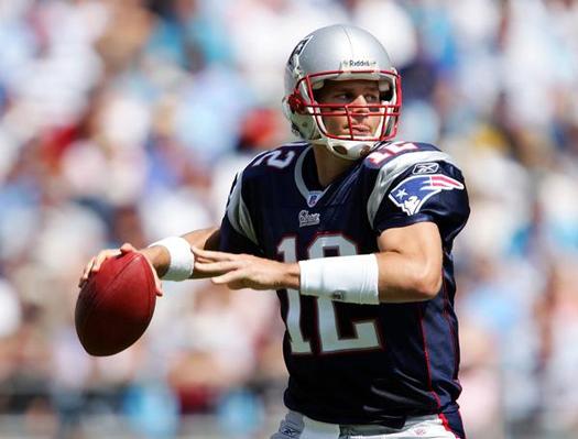 tom brady throwing a football